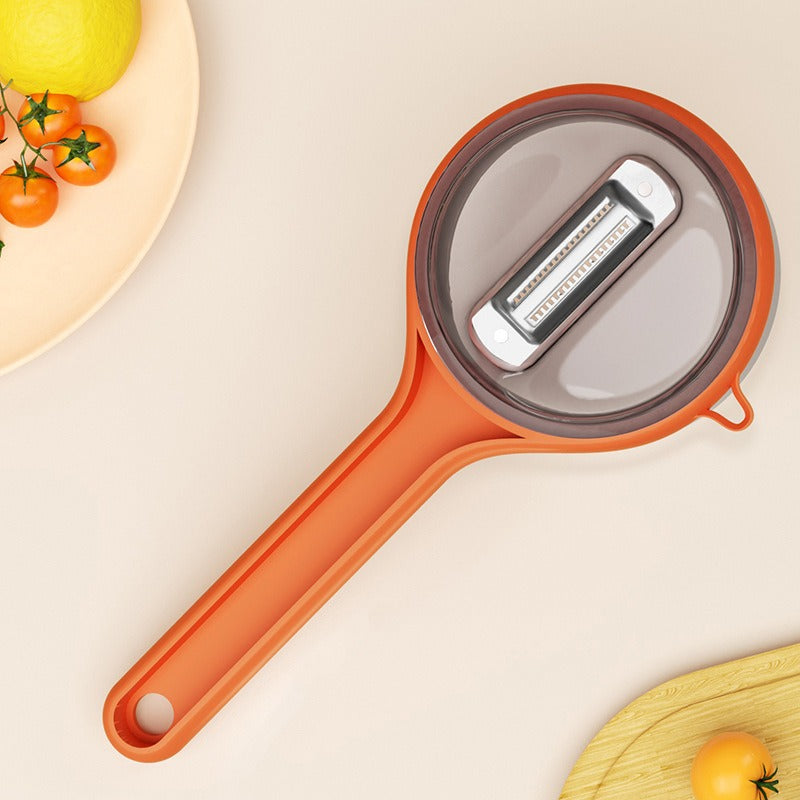 Vegetable Peeler with Peel Collector